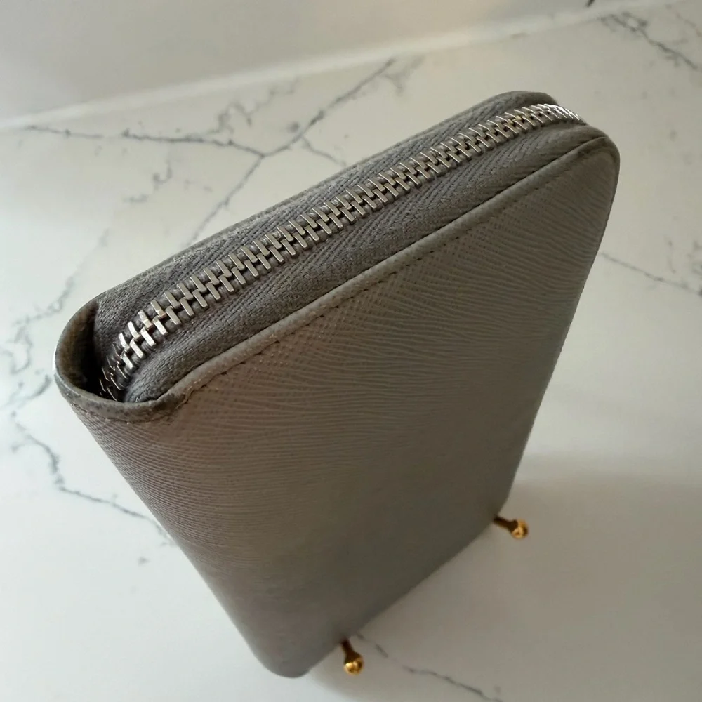 Authentic Prada Gray Leather wallet with mint interior